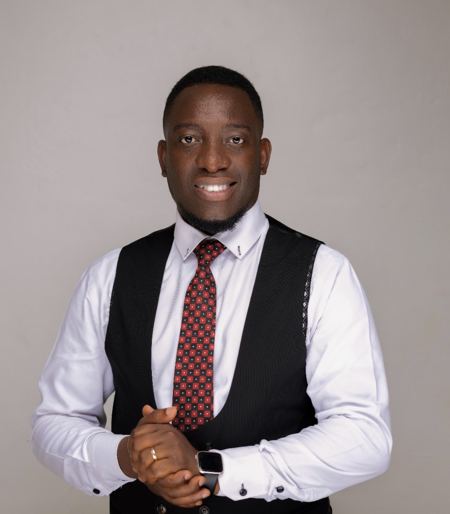 Ssendi Samuel in professional attire